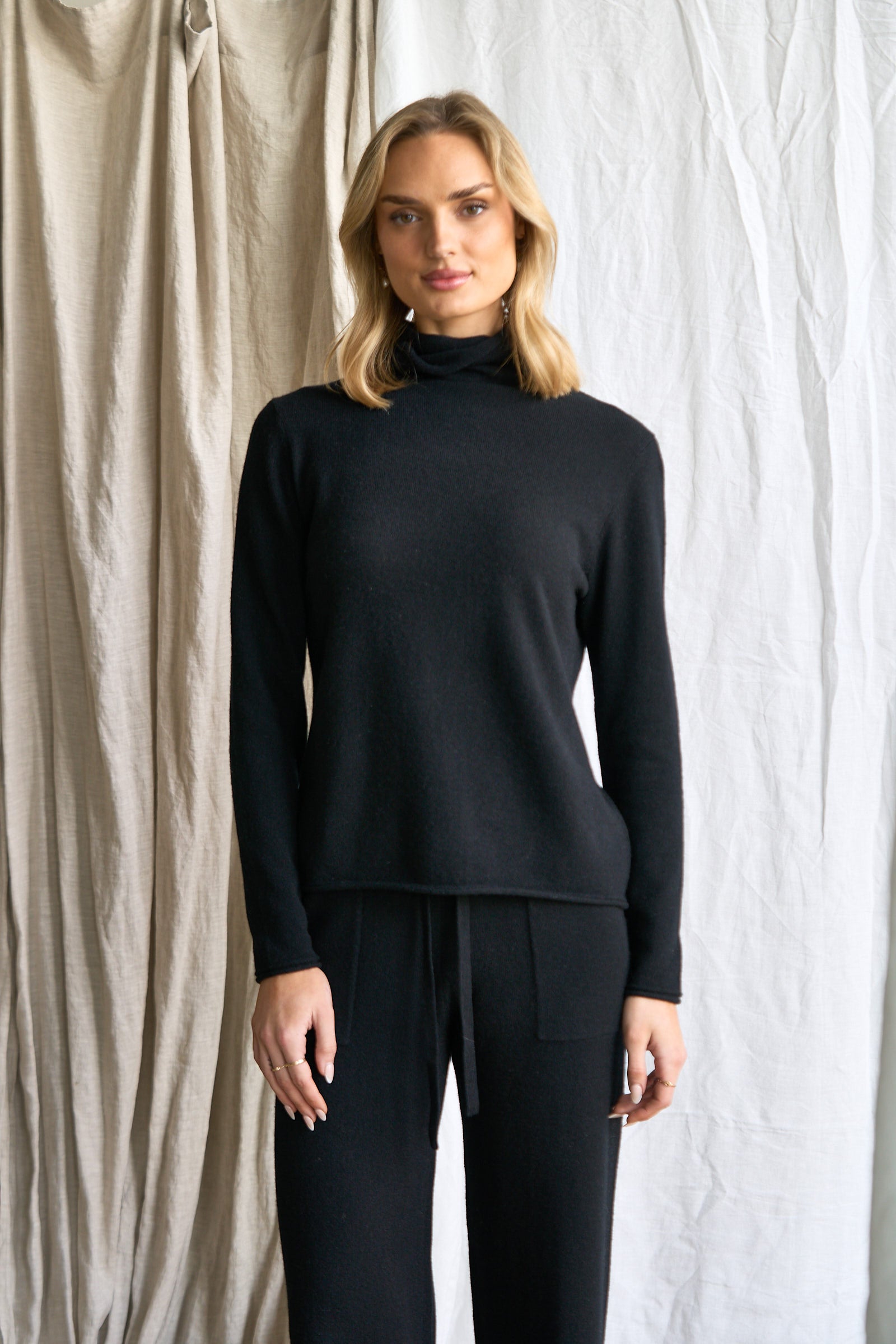 Women's High Neck Cashmere Sweater – 100% Pure Cashmere | Long Sleeve Knitwear

Elevate your winter wardrobe with our luxurious women's high neck cashmere sweater, crafted from 100% premium cashmere. This long sleeve sweater offers a flattering, relaxed fit and a chic high neckline for extra warmth and style.

Perfect for layering or wearing on its own, our cashmere knit is soft, breathable, and naturally insulating—ideal for cold-weather dressing. Designed in Australia and ethically made.